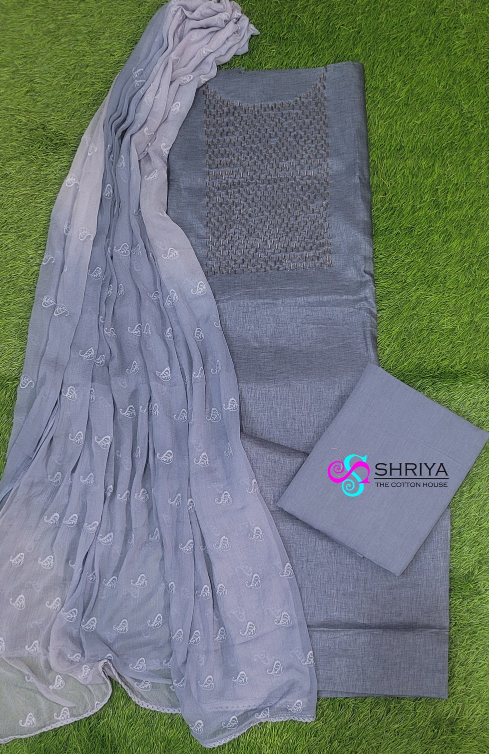 Semi tussar top with a handwork on yoke paired with a Embroidered soft chiffon dupatta and cotton silk bottom