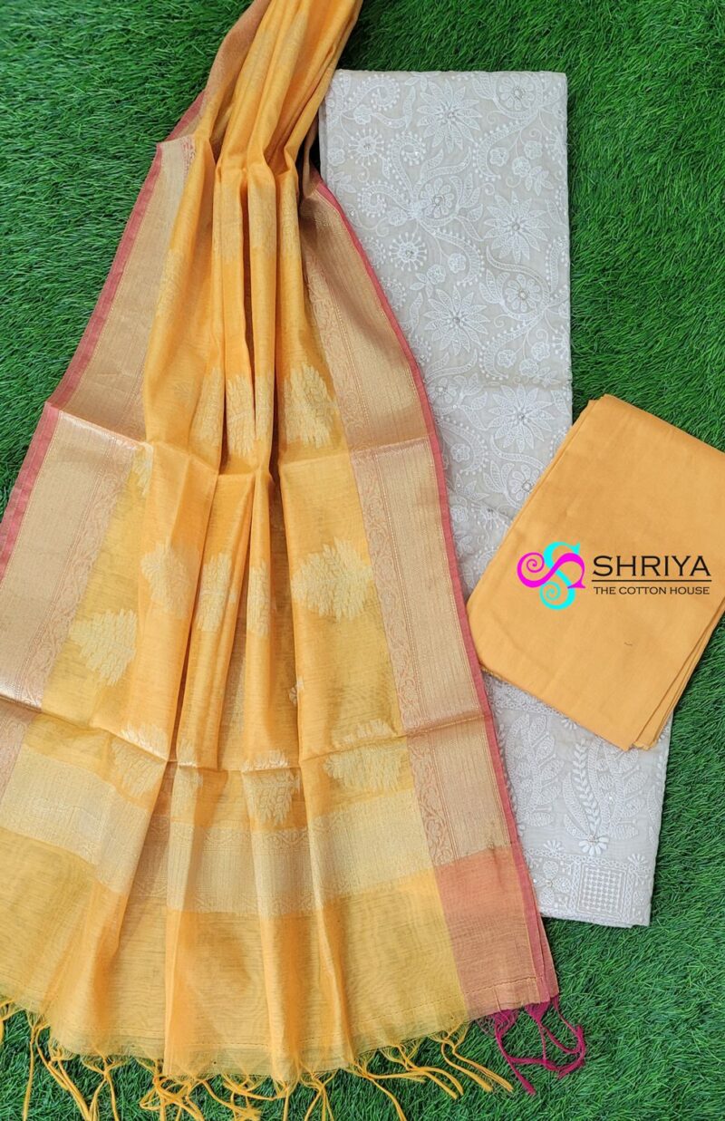 Soft chanderi silk top with allover chikankari embroidery paired with a benaras weaved silk dupatta and cotton silk bottom