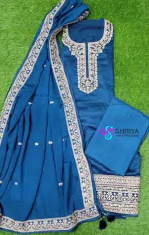 Soft dola silk top paired with a embroidered pure georgette dupatta and cotton silk bottom