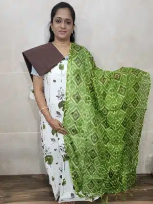 Printed pure cotton top paired with a printed Kota cotton dupatta and contrast cotton bottom 