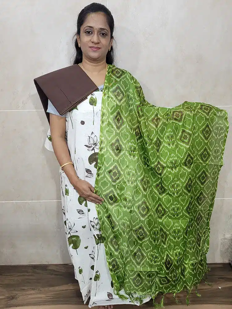 Printed pure cotton top paired with a printed Kota cotton dupatta and contrast cotton bottom