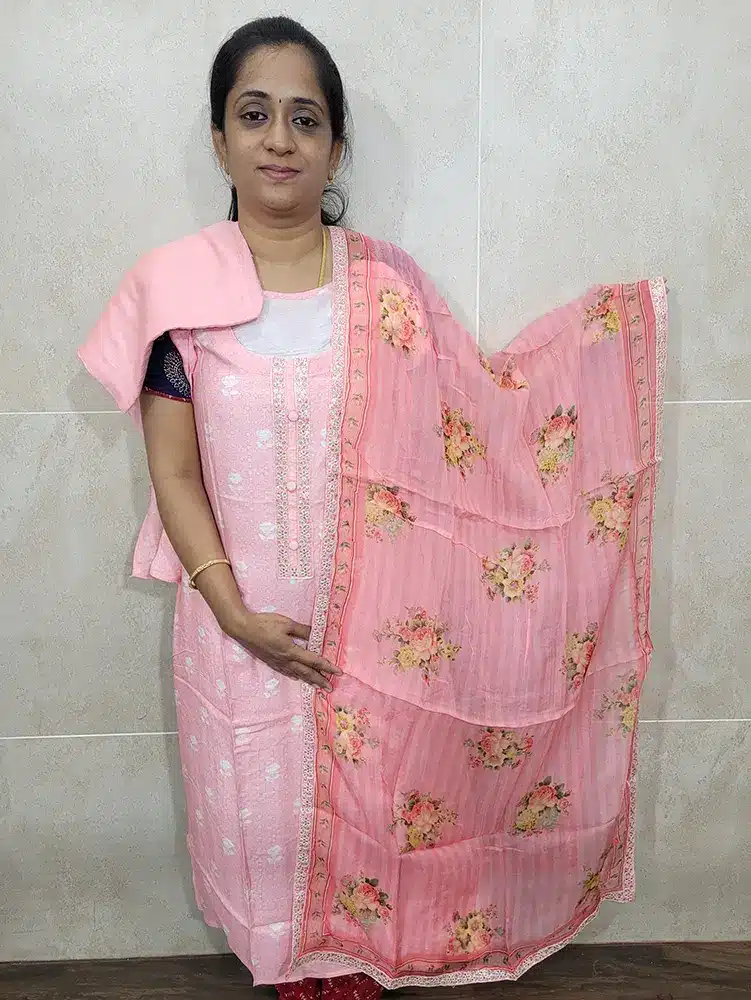 Printed pure muslin silk top paired with a digital printed organza dupatta and cotton silk bottom