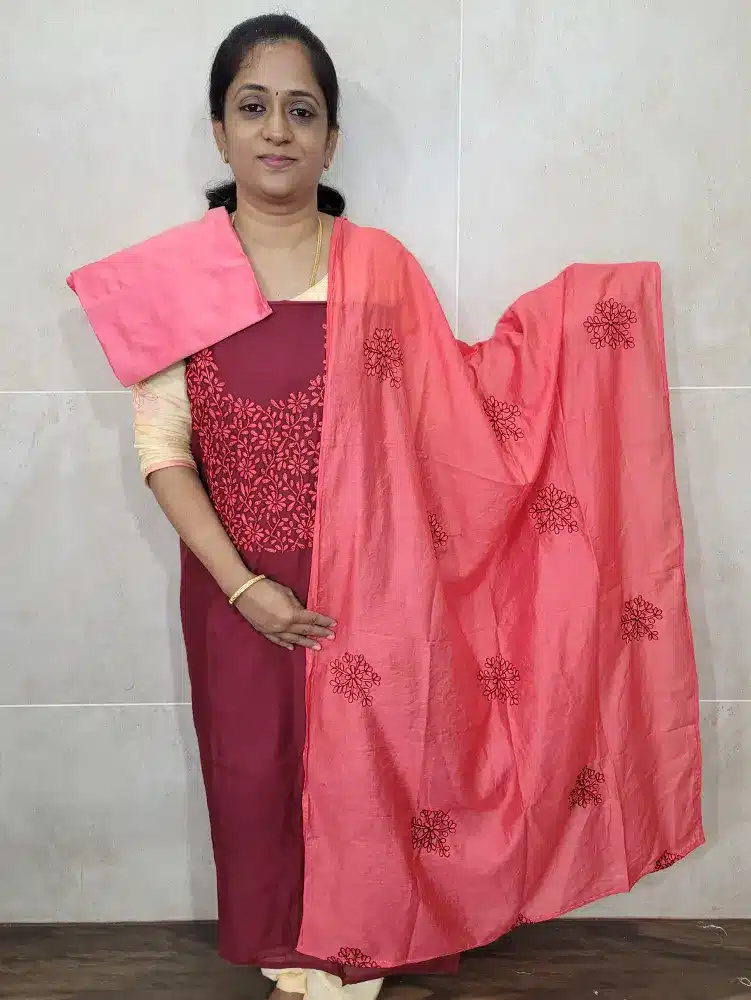 Soft silk top with embroidered yoke paired with a embroidered soft silk dupatta and cotton silk bottom