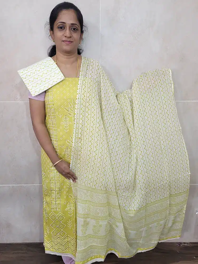 Premium quality printed soft cotton top with allover kantha stitch paired with printed soft cotton dupatta and printed cotton bottom