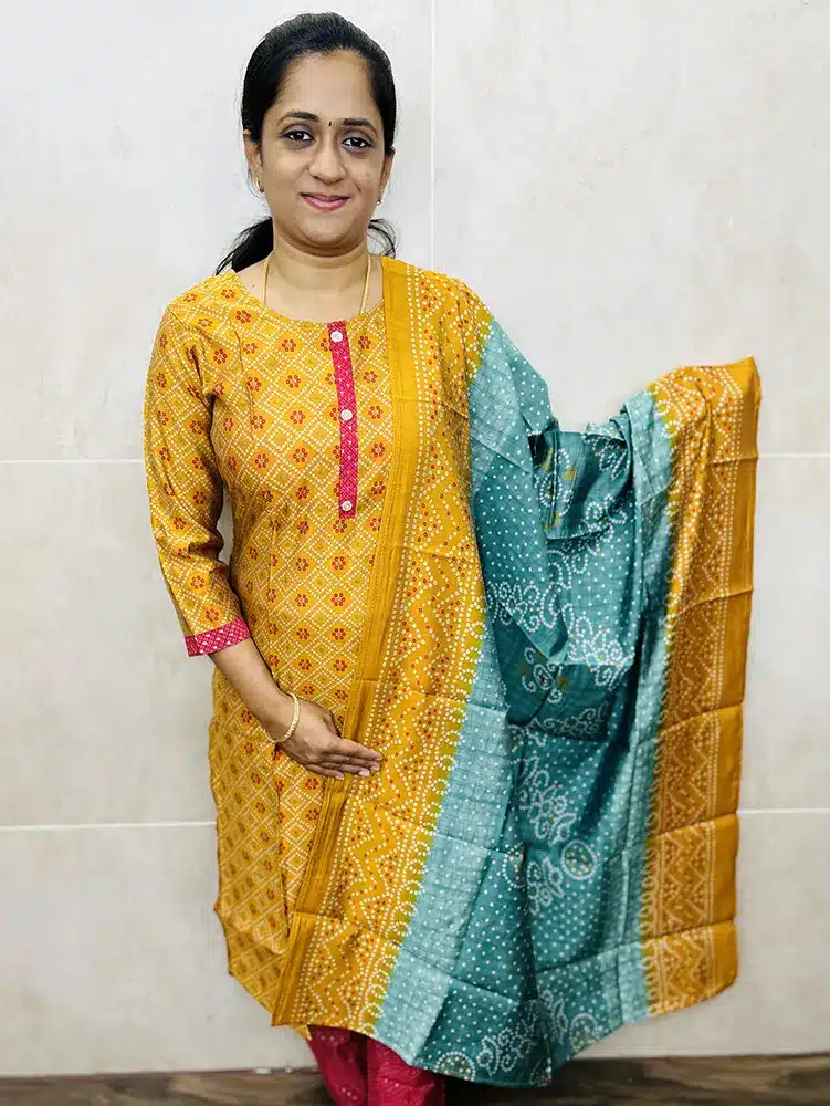 Printed muslin silk top paired with a printed muslin silk dupatta and printed muslin silk bottom