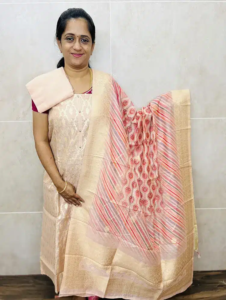 Zari weaved Chanderi silk top paired with a digital printed and zari weaved Benaras silk dupatta and cotton silk bottom