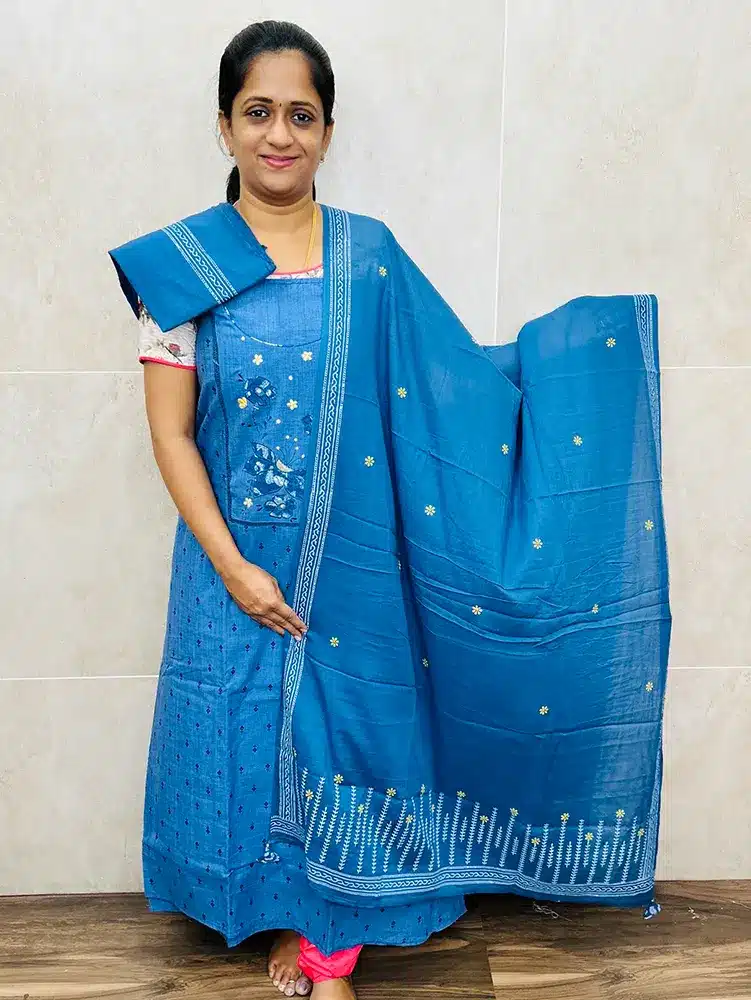 Soft denim cotton top with patchworked yoke paired with a printed cotton dupatta and cotton bottom