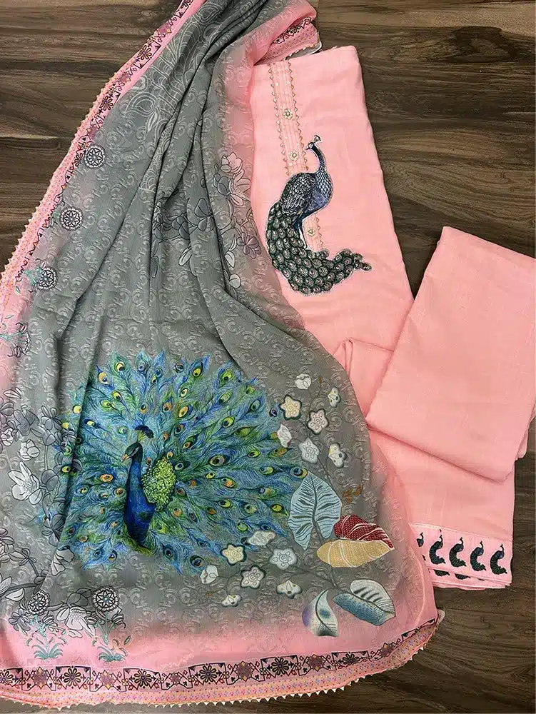 Soft cotton top with designer patch work on yoke paired with a printed pure chiffon dupatta and muslin cotton bottom - Image 2