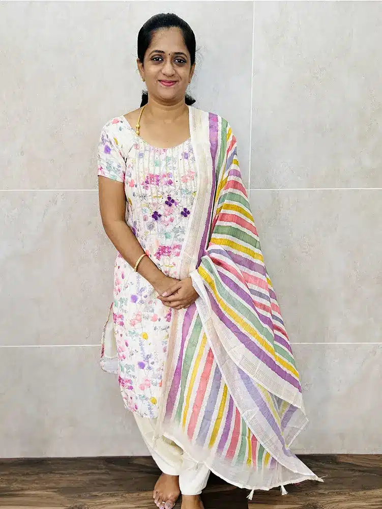 Printed linen cotton top with beautiful handwork on yoke paired with a printed linen cotton dupatta and muslin cotton bottom