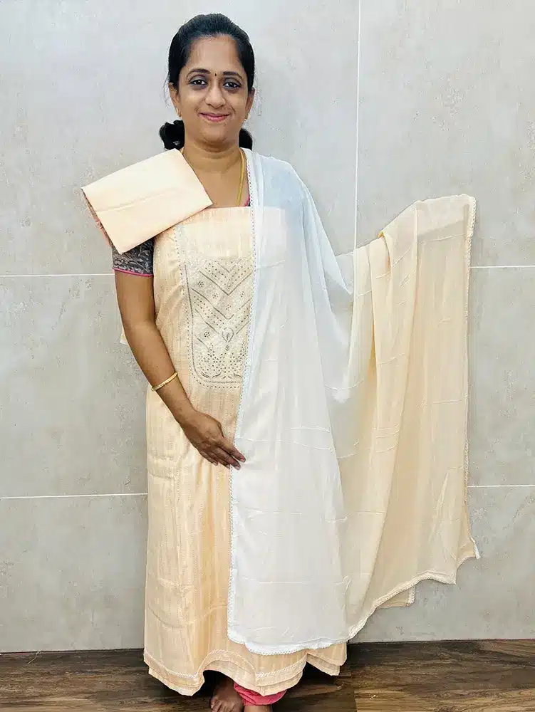 (Light Peach) Premium handloom cotton top with embroidered yoke paired with chiffon dupatta and cotton bottom