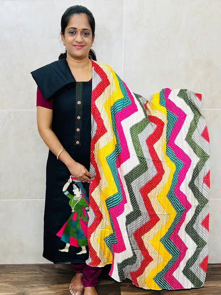 (Black) Rayon top with embroidered Daman paired with printed crush silk dupatta and rayon bottom