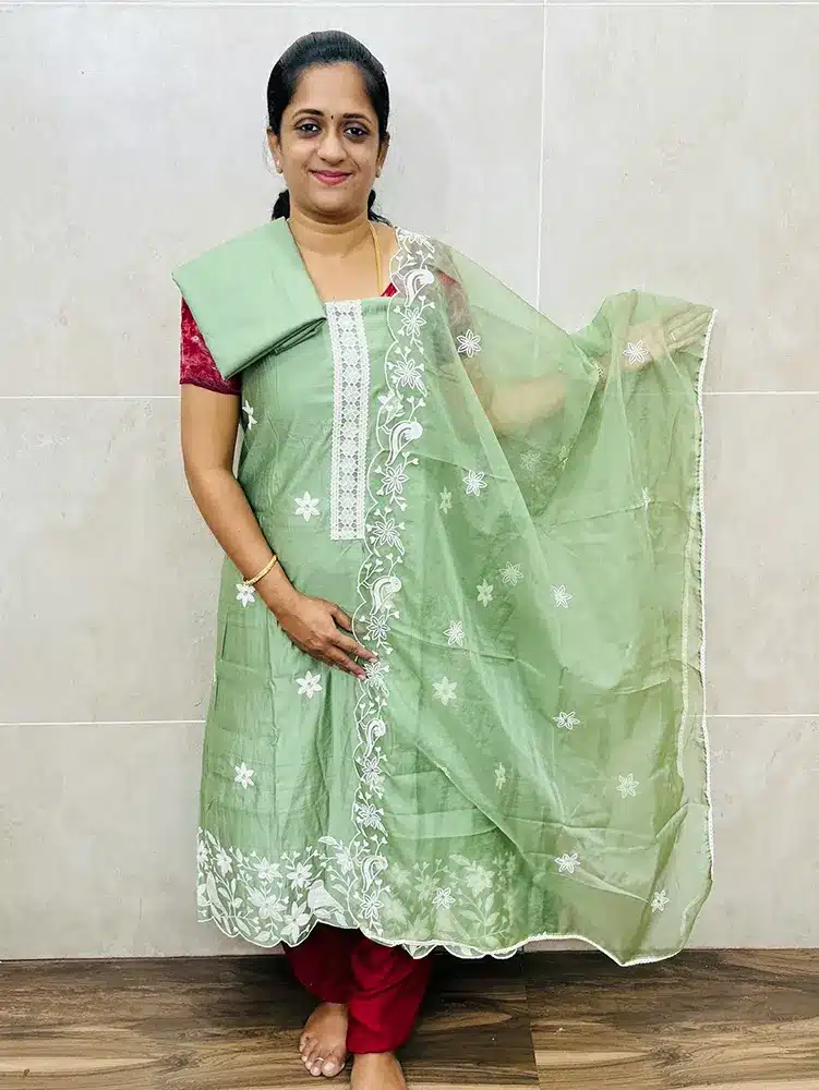 Soft modal silk with embroidered buttas paired with embroidered organza dupatta and modal silk bottom