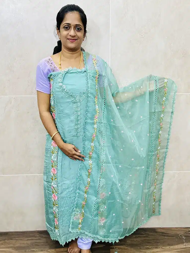 Pure organza top with allover embroidery paired with embroidery organza dupatta and cotton silk bottom