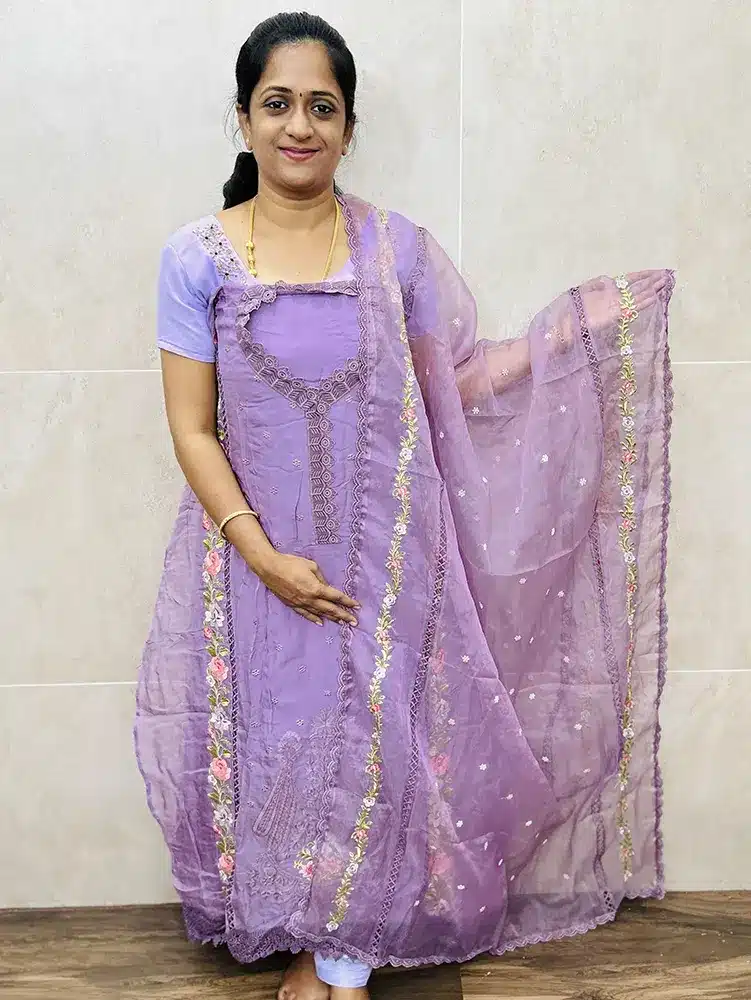 Pure organza top with allover embroidery paired with embroidery organza dupatta and cotton silk bottom