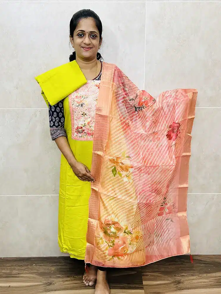 Soft cotton top with beautiful yoke paired with digital printed organza dupatta and soft silk bottom