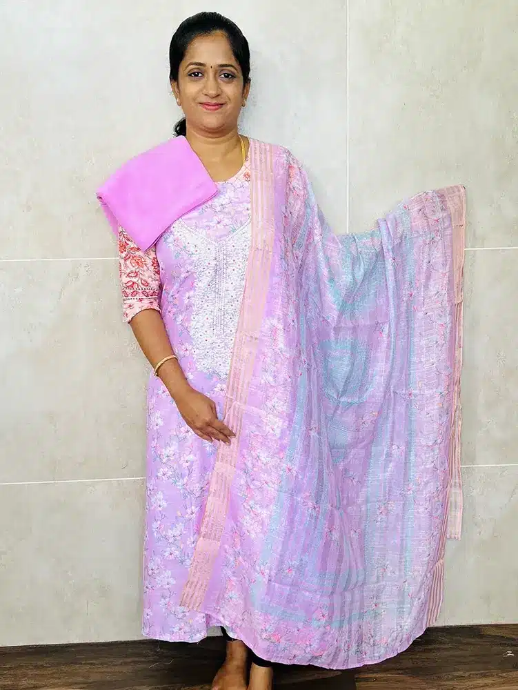 Printed linen cotton top with embroidered yoke paired with printed linen dupatta and cotton bottom - Image 2