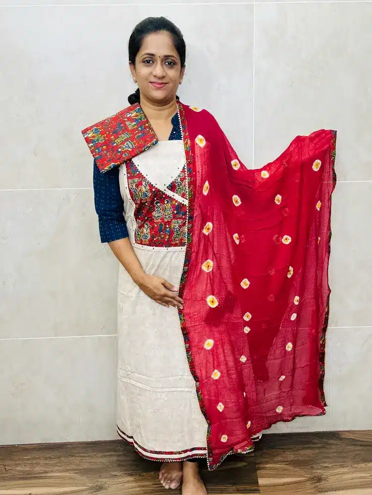 Premium quality cotton top with embroidered yoke paired with pure Georgette bhandini dupatta and printed cotton bottom - Image 2