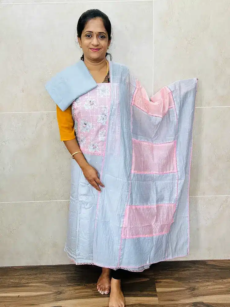 Soft silk top with embroidered yoke paired with soft silk dupatta and cotton silk bottom