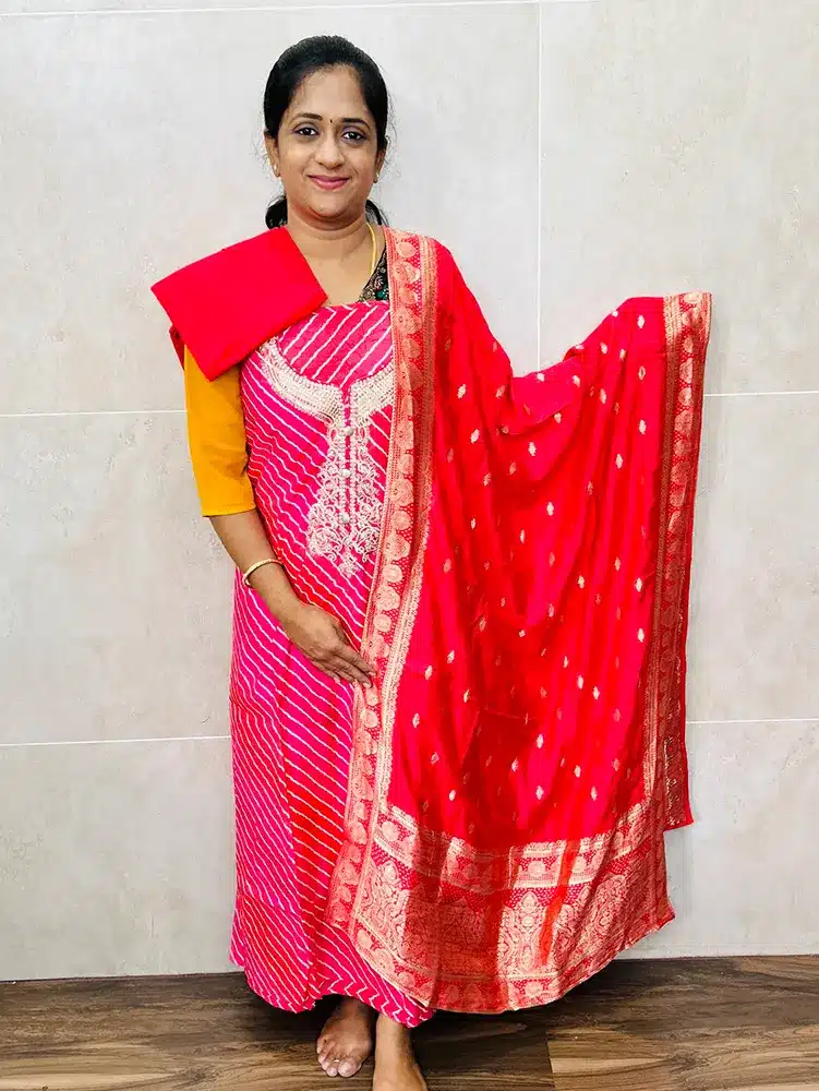 Premium soft silk top with embroidered yoke with zari weaved soft silk dupatta and cotton silk bottom