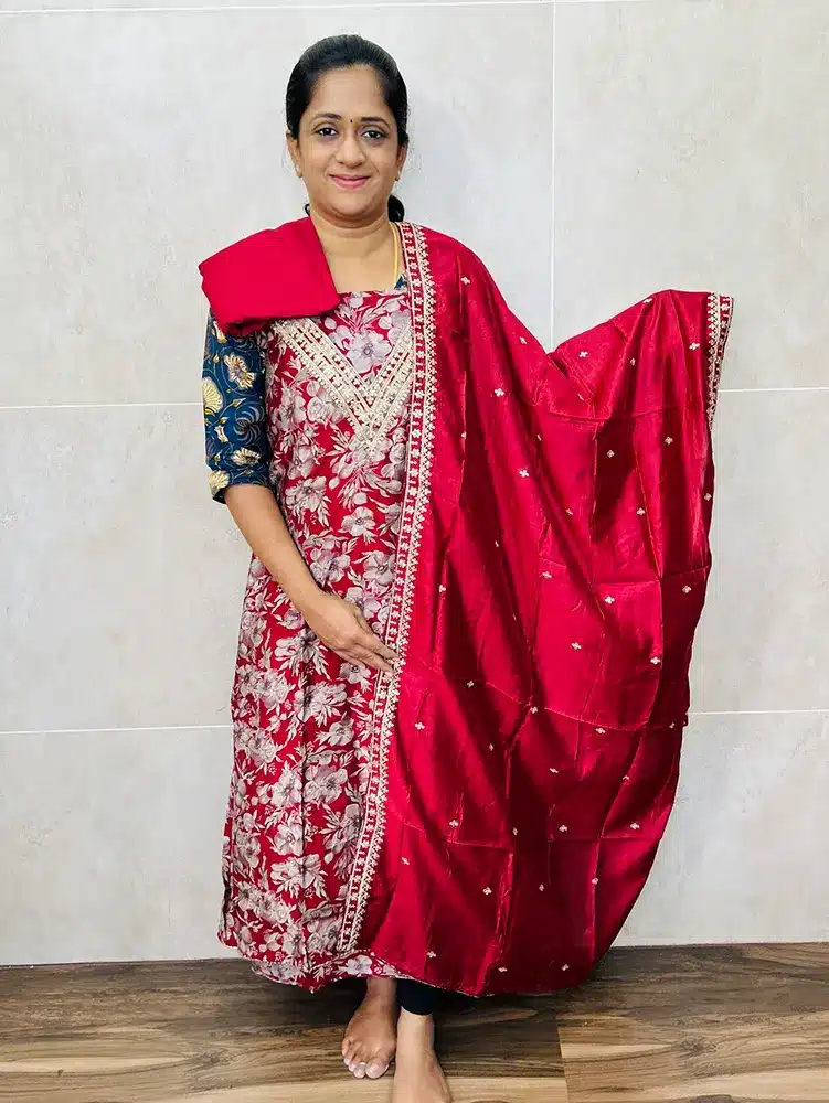 Modal silk top with embroidered yoke paired with soft silk dupatta and cotton silk bottom