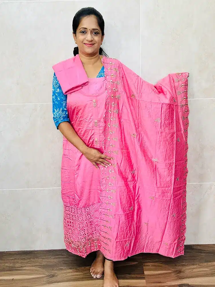 Soft silk top with lace cutwork paired with embroidered soft silk dupatta and cotton silk bottom