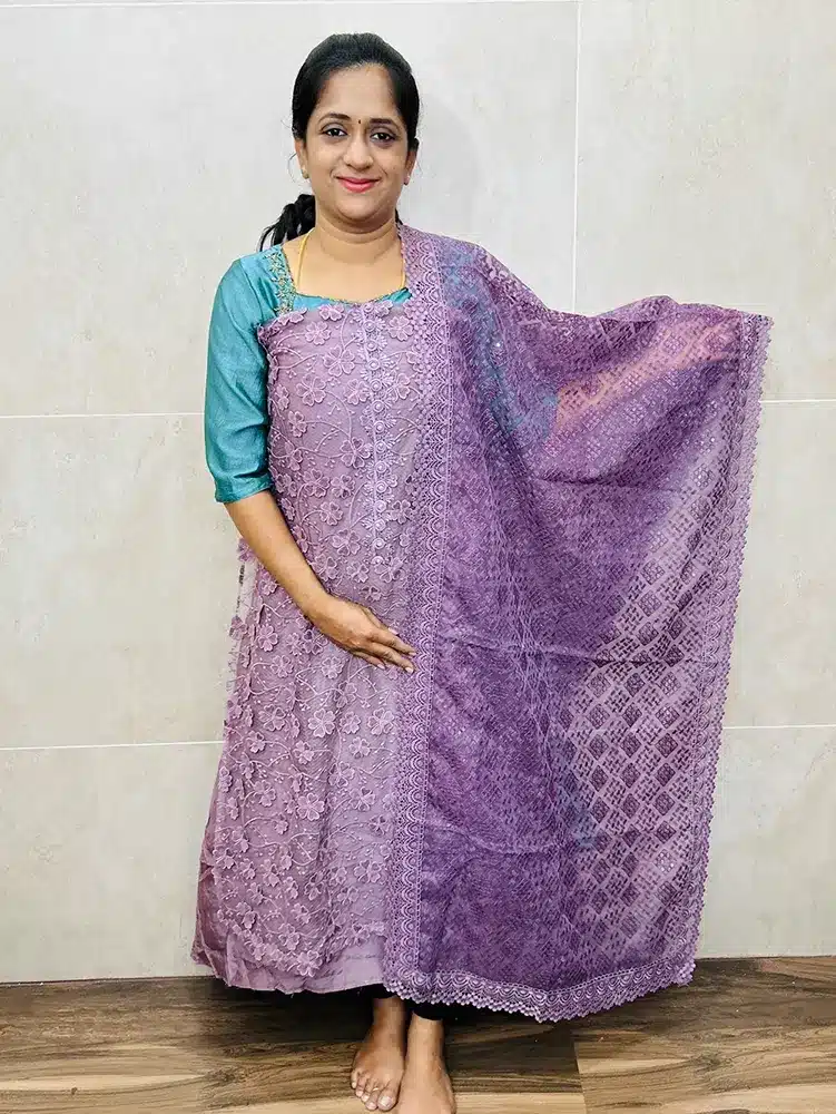 Organza top with designer floral work allover the top paired with embroidered organza dupatta and cotton silk bottom