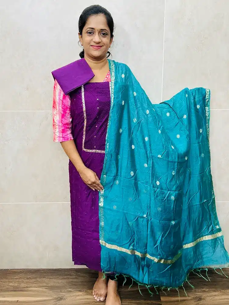 Soft silk top with allover embroidery buttas paired with soft silk dupatta and cotton bottom