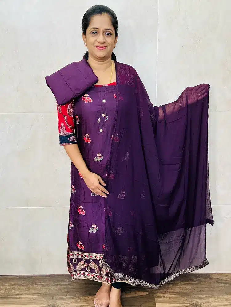 Dola silk top with allover weaving paired with georgette dupatta and cotton silk bottom