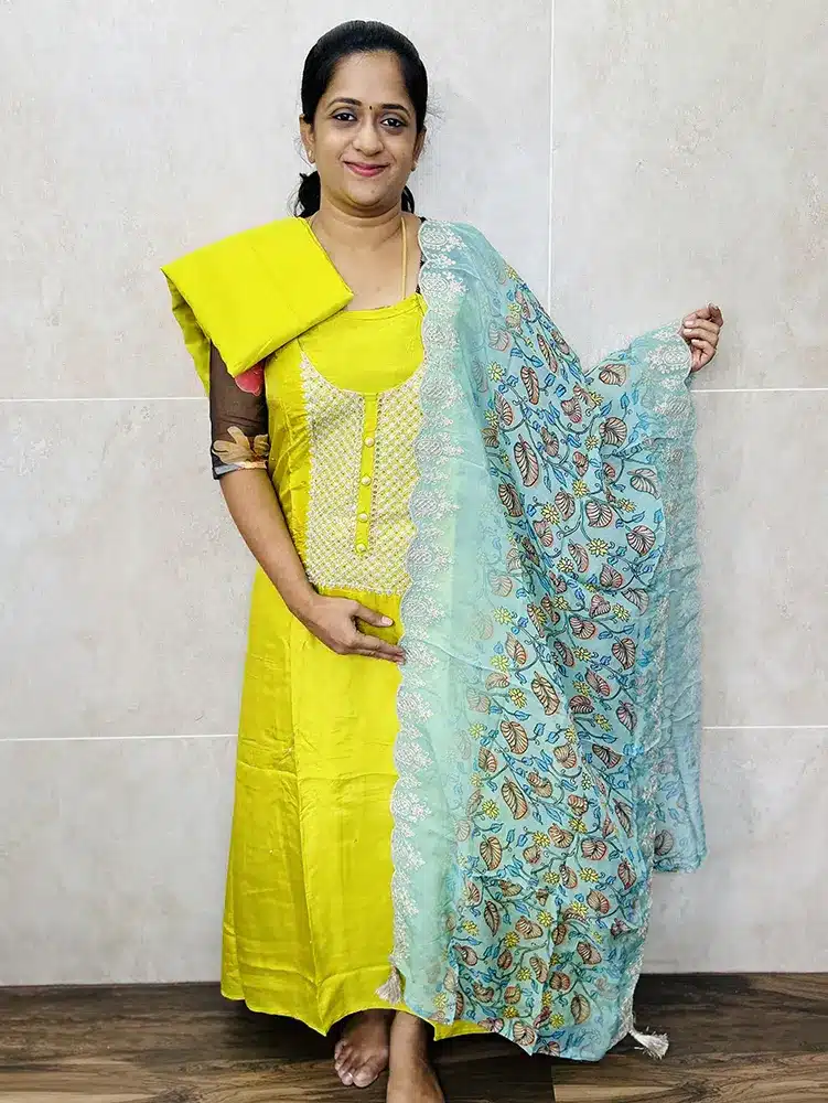 Pure uppada silk top with rich embroidered yoke paired with pure organza dupatta and cotton silk bottom