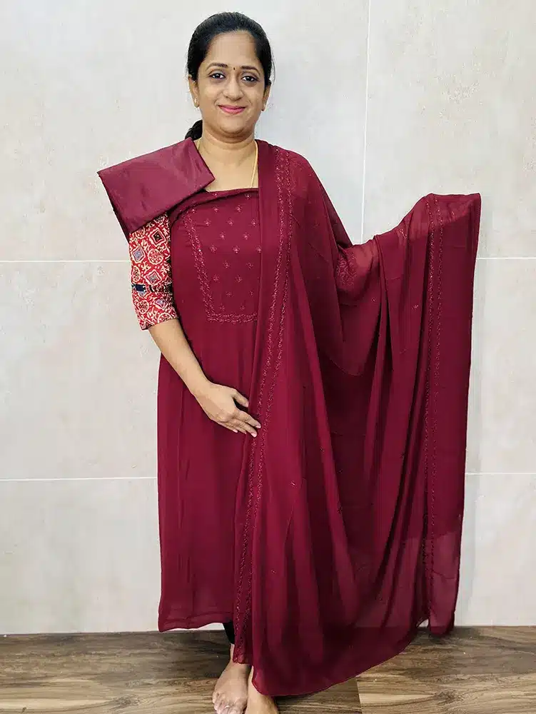 Georgette top with embroidered yoke paired with embroidered Georgette dupatta and silk bottom
