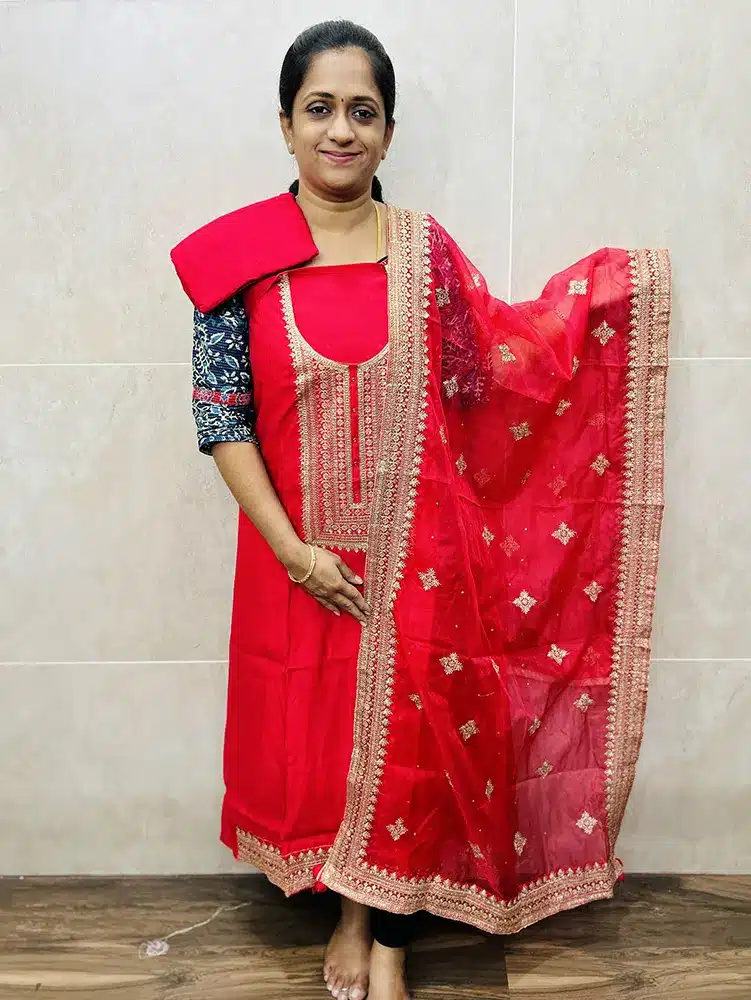 (Rani pink) Soft modal silk top with embroidered yoke paired with embroidered organza dupatta and cotton silk bottom