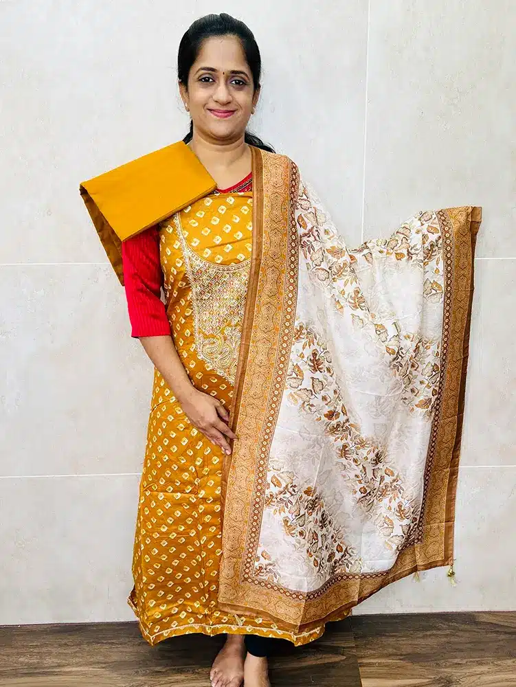 Printed Rayon top with embroidered yoke paired with printed soft cotton dupatta and cotton bottom