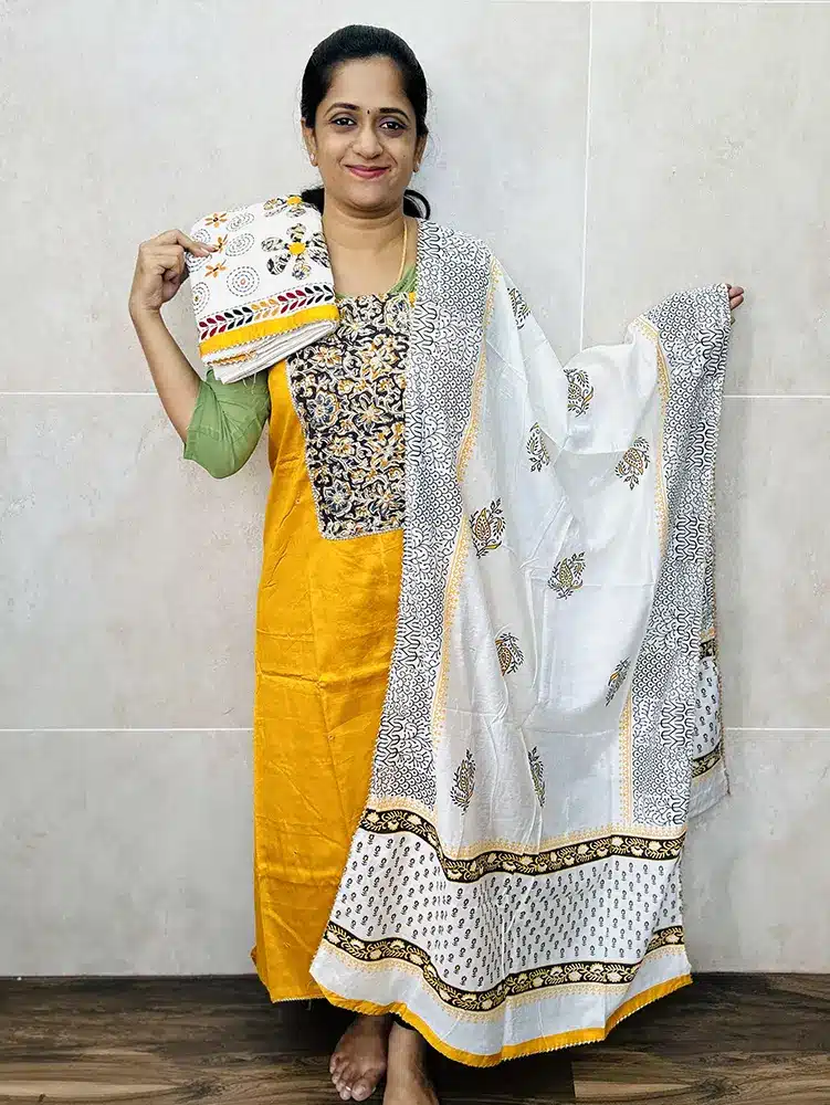 Soft cotton top with Kalamkari patchwork on yoke paired with designer cotton bottom and block printed soft silk dupatta