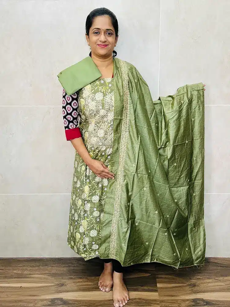 Printed modal silk top with embroidered yoke paired with embroidered soft silk dupatta and cotton silk bottom