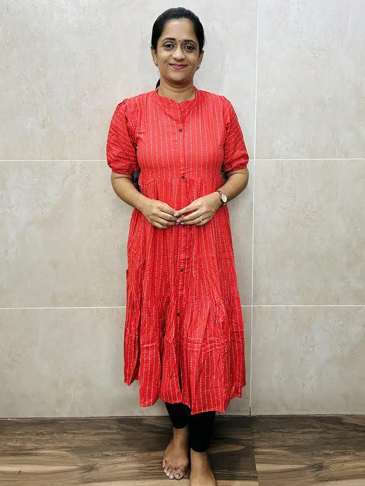 Light orange - Imported Printed Rayon top with allover fancy buttons and layered patterned (Gown pattern)