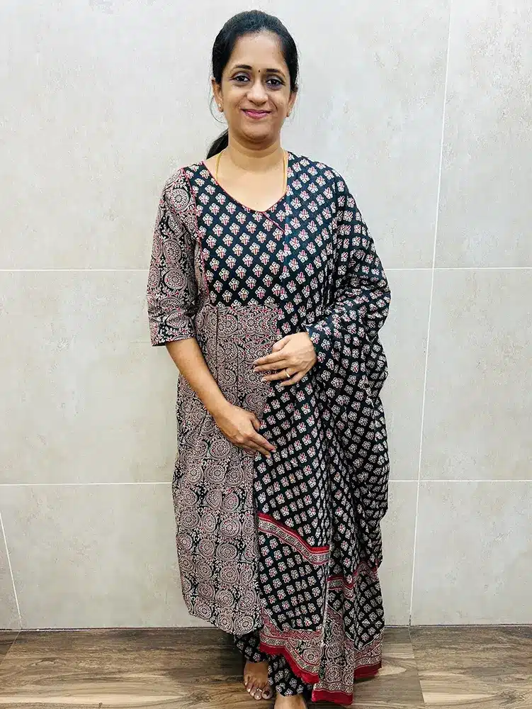 Black - Ajrakh printed cotton top (cotton lining) with patchworked yoke paired with printed cotton dupatta and printed cotton bottom (straight cut)