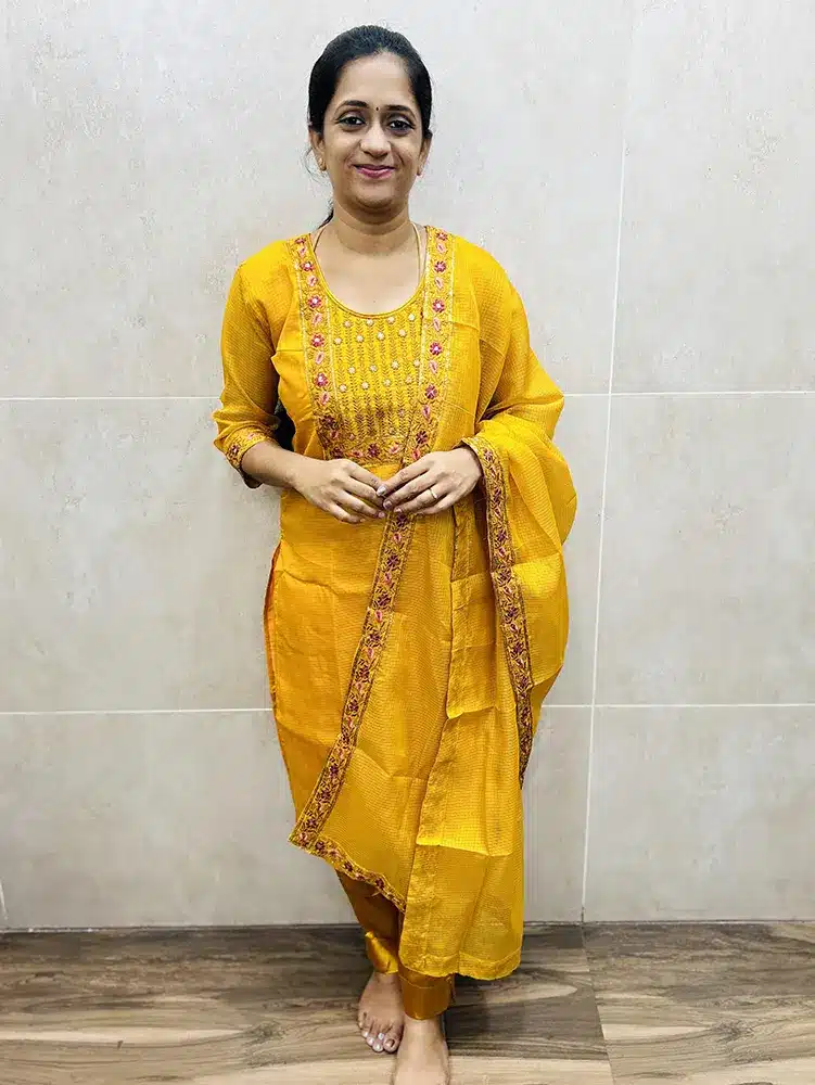 Yellow - Soft net Kota top with embroidered yoke (cotton lining) paired with embroidered net Kota dupatta and Santoon silk bottom (straight cut)