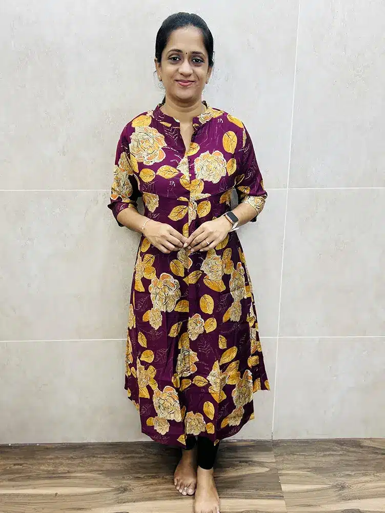 Maroon - Printed modal silk top (crepe lining) with potli work on yoke (Aline pattern)