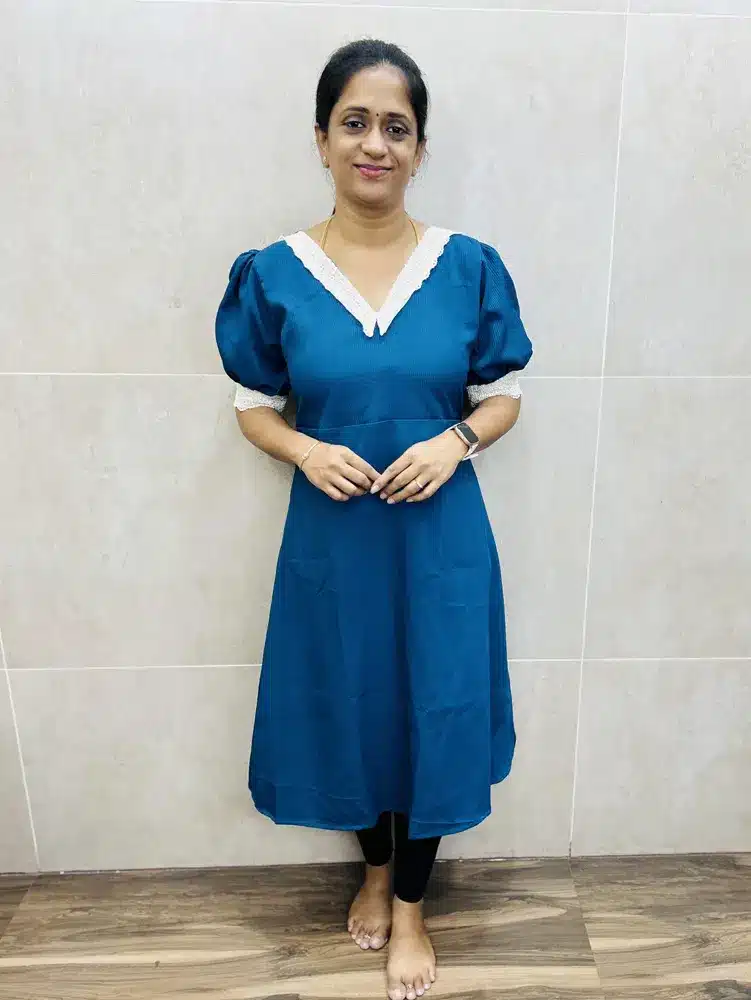 (Teal Blue)Imported stretchable Rayon top with crochet lace work on neck and sleeves(Gown pattern)