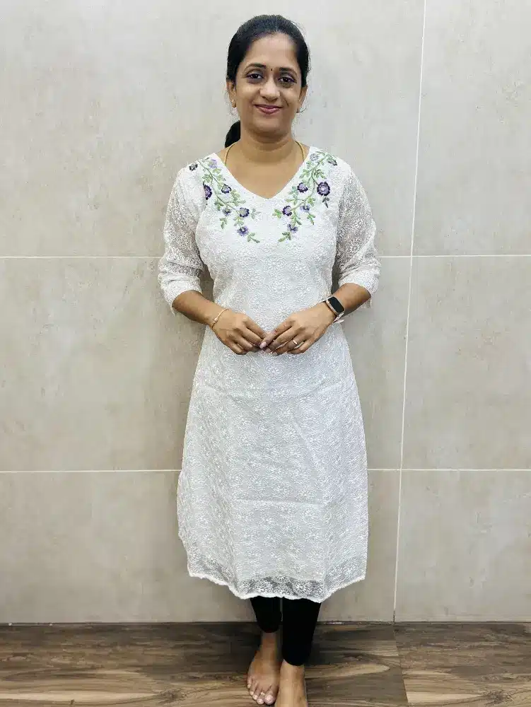 Purple - Soft Kota top (crepe lining) with allover phulkari work and machine embroidery work on yoke (Aline pattern)