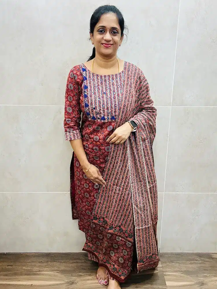 Red - Ajrakh printed cotton top (cotton lining) with beadwork on yoke paired with printed cotton dupatta and cotton bottom (straight cut)