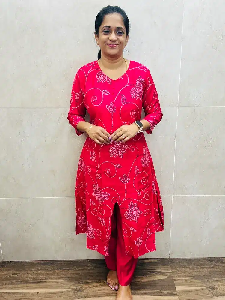 Rani Pink - Printed premium muslin silk top (cotton lining) with potli work in yoke paired with muslin silk bottom (Flared Aline pattern)
