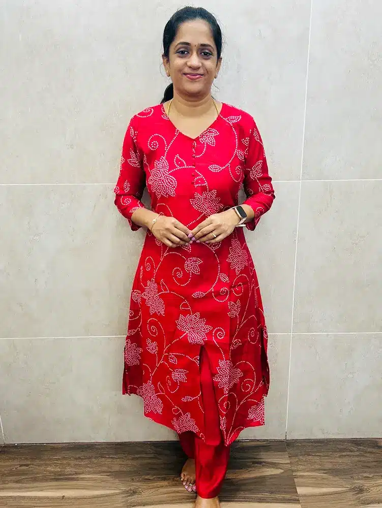 Red - Printed premium muslin silk top (cotton lining) with potli work in yoke paired with muslin silk bottom (Flared Aline pattern)