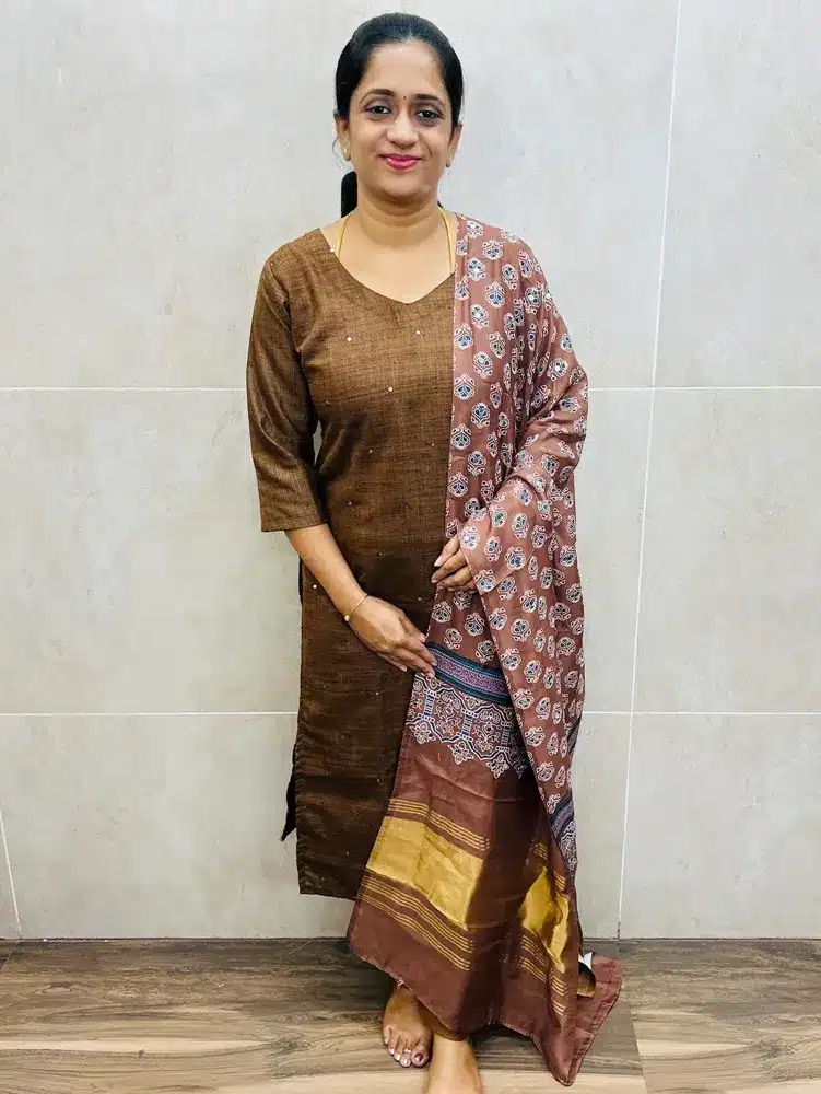 Premium linen cotton top(crepe lining)with all over mirror work paired with mirror worked Ajrakh printed soft silk dupatta and silk bottom(straight cut)