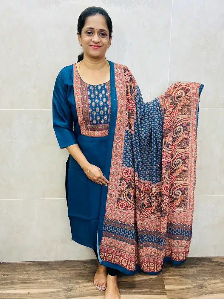 Premium muslin silk top (cotton lining) with mirror worked yoke paired with mirror worked Georgette dupatta with crochet lace work