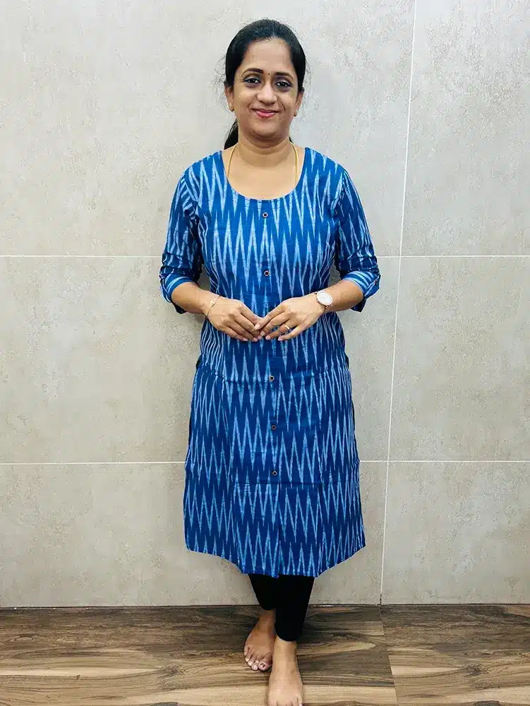 Pure Ikkat cotton top (cotton lining) with all over fancy buttons (Princess cut straight Kurti)