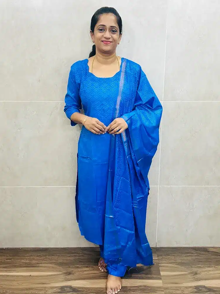 Semi Tussar top (cotton lining) with all over Kantha patterns paired with semi Tussar dupatta and silk bottom (free size)