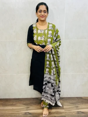 Pure cotton top with cotton lining, featuring elegant Kalamkari patchwork on the yoke. Comes with a matching Kalamkari dupatta and comfortable cotton bottom. (Free size)