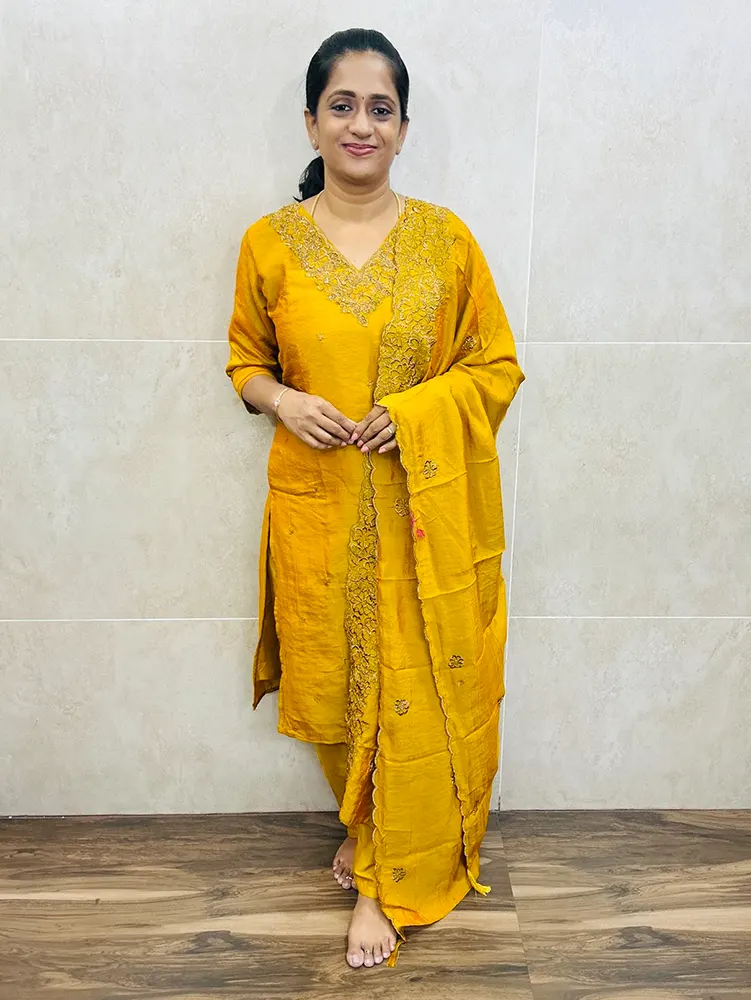 Premium soft silk top with full crepe lining, featuring intricate embroidery and handwork on the yoke. Paired with an embroidered soft silk dupatta and matching silk bottom. (Free size)