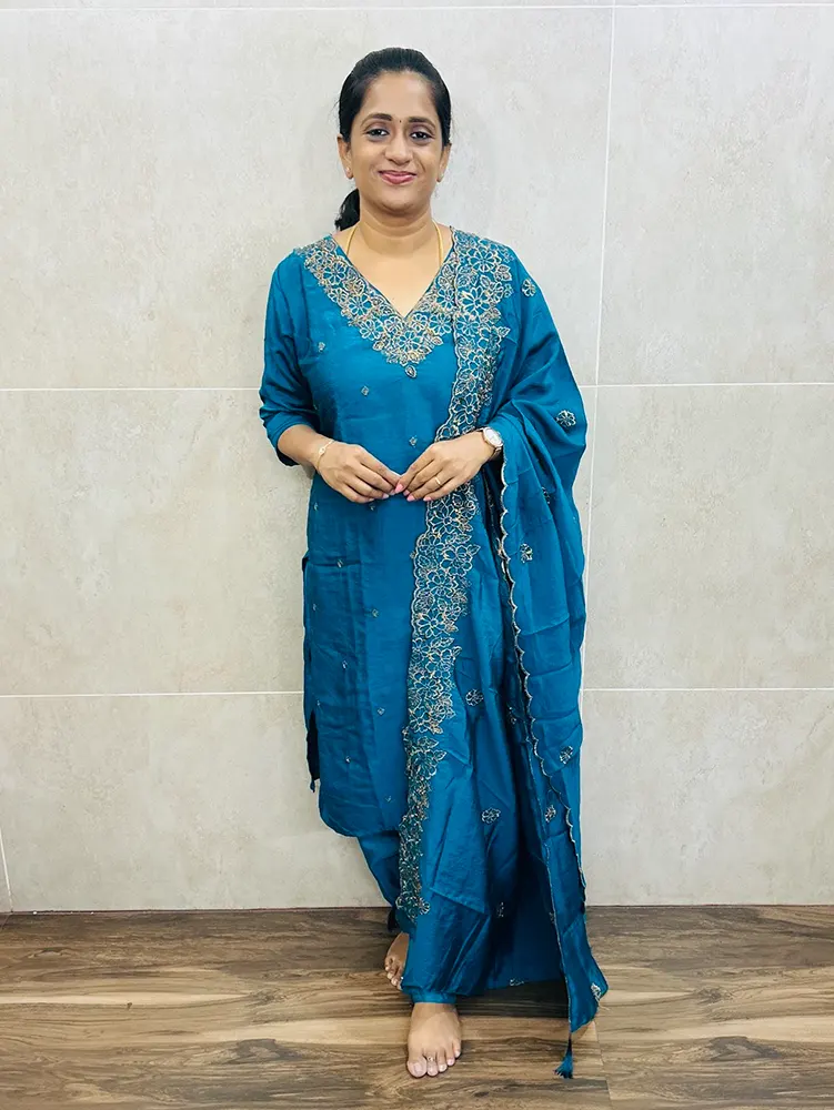 Premium soft silk top with full crepe lining, featuring intricate embroidery and handwork on the yoke. Paired with an embroidered soft silk dupatta and matching silk bottom. (Free size)